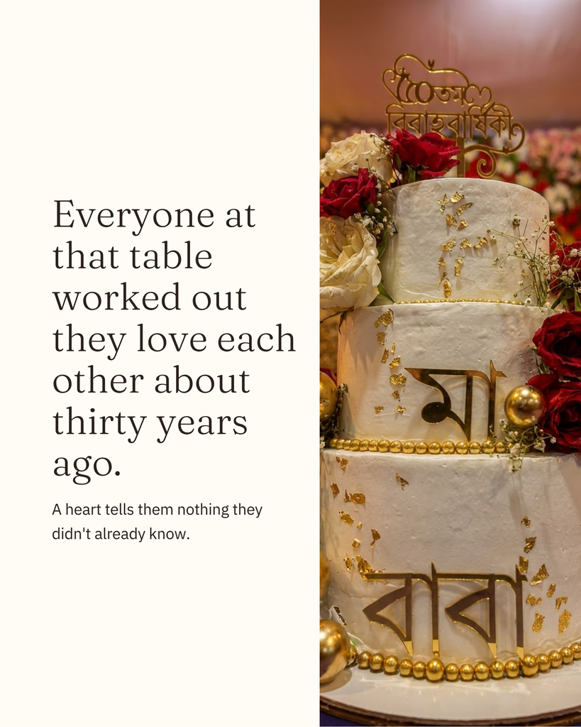 Personalised Bengali anniversary cake with the message that everyone at the table worked out their love story years ago.